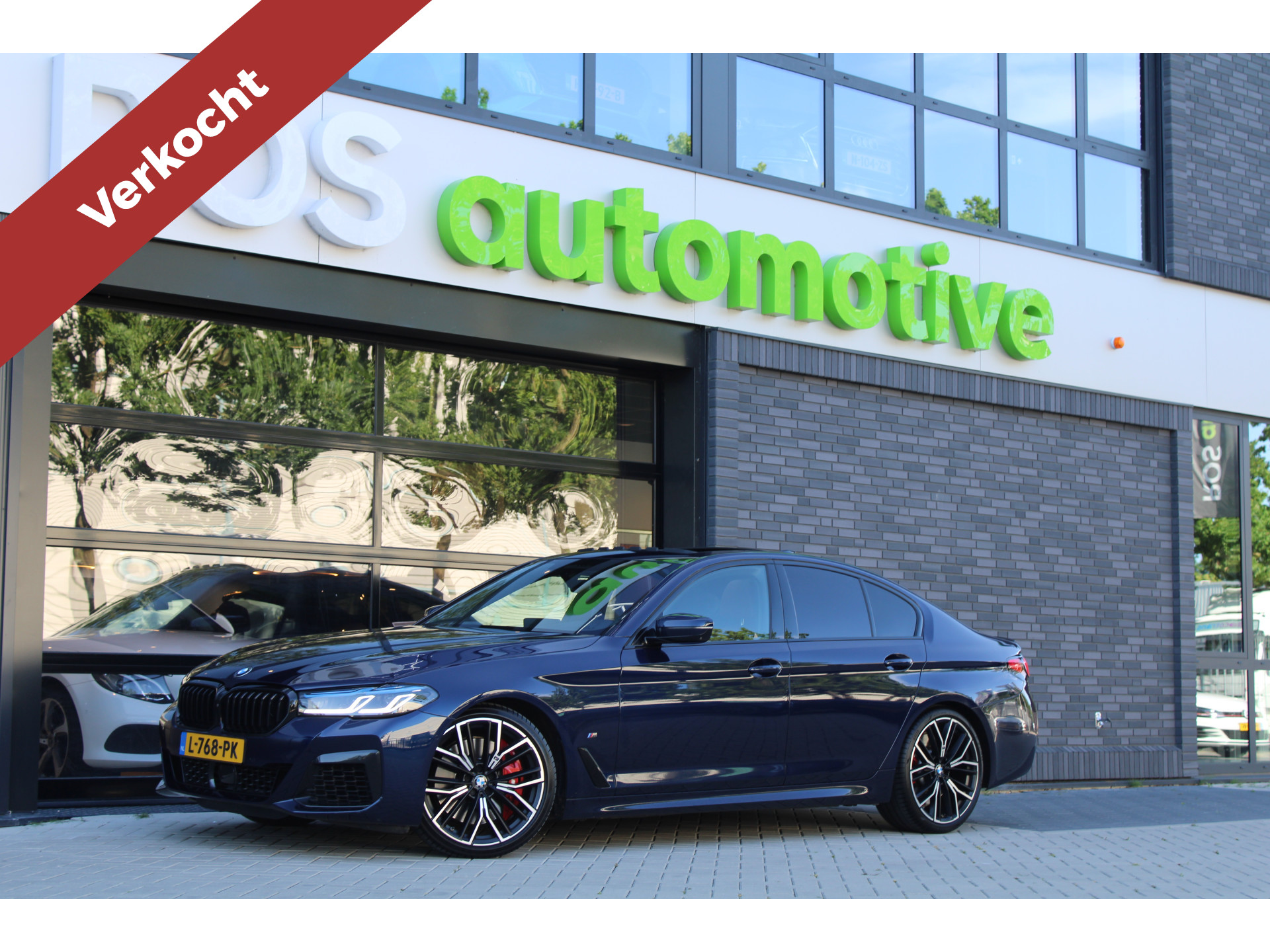 BMW 5 Serie M550i xDrive High Executive 46042785-0.jpg | ROS Automotive